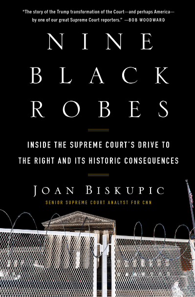 Cover of Nine Black Robes by Joan Biskupic, Supreme Court building behind fence with barbed wire on black background